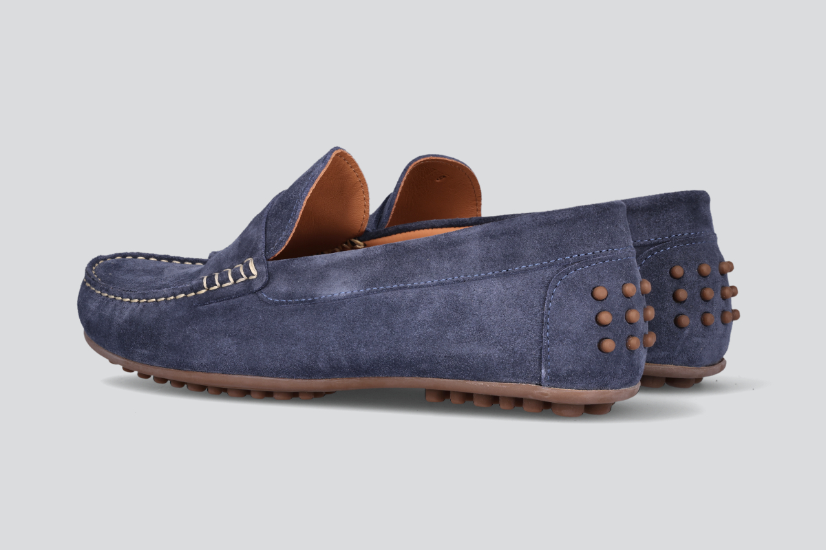 A pair of navy men's miles driver loafers from the Hartt Shoe Company
