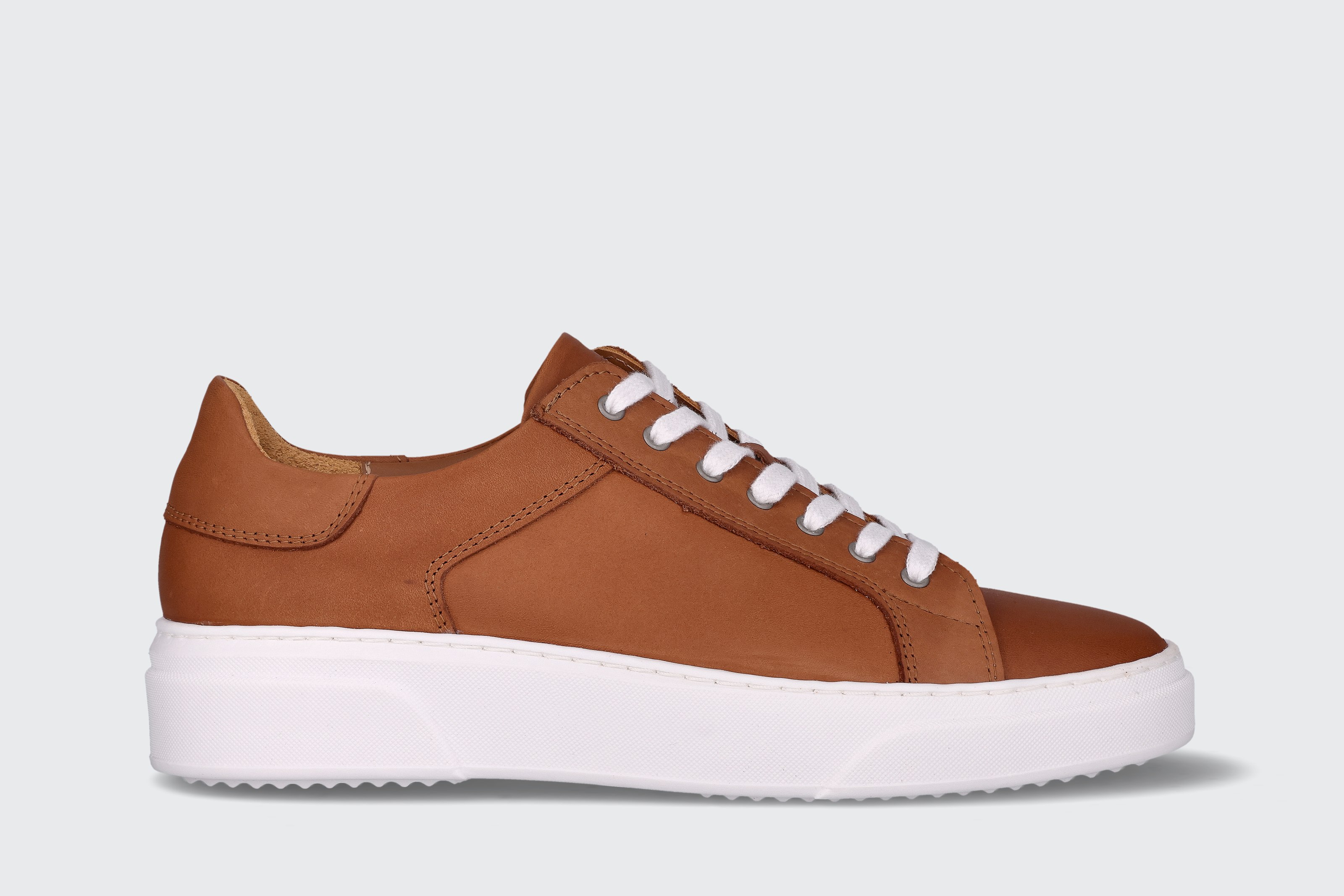 A cognac men's low top sneaker from the Hartt Shoe Company