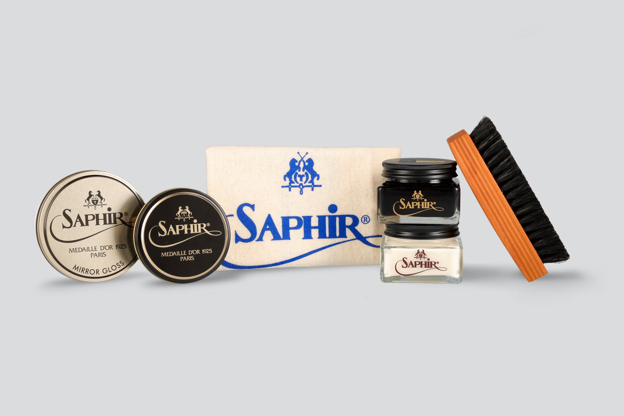 A saphir shoe polish kit with shine brush from the Hartt Shoe company
