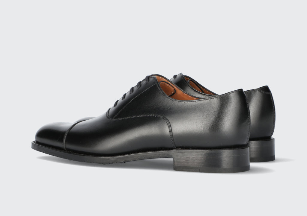 A pair of men's black oxfords from the Hartt Shoe Company
