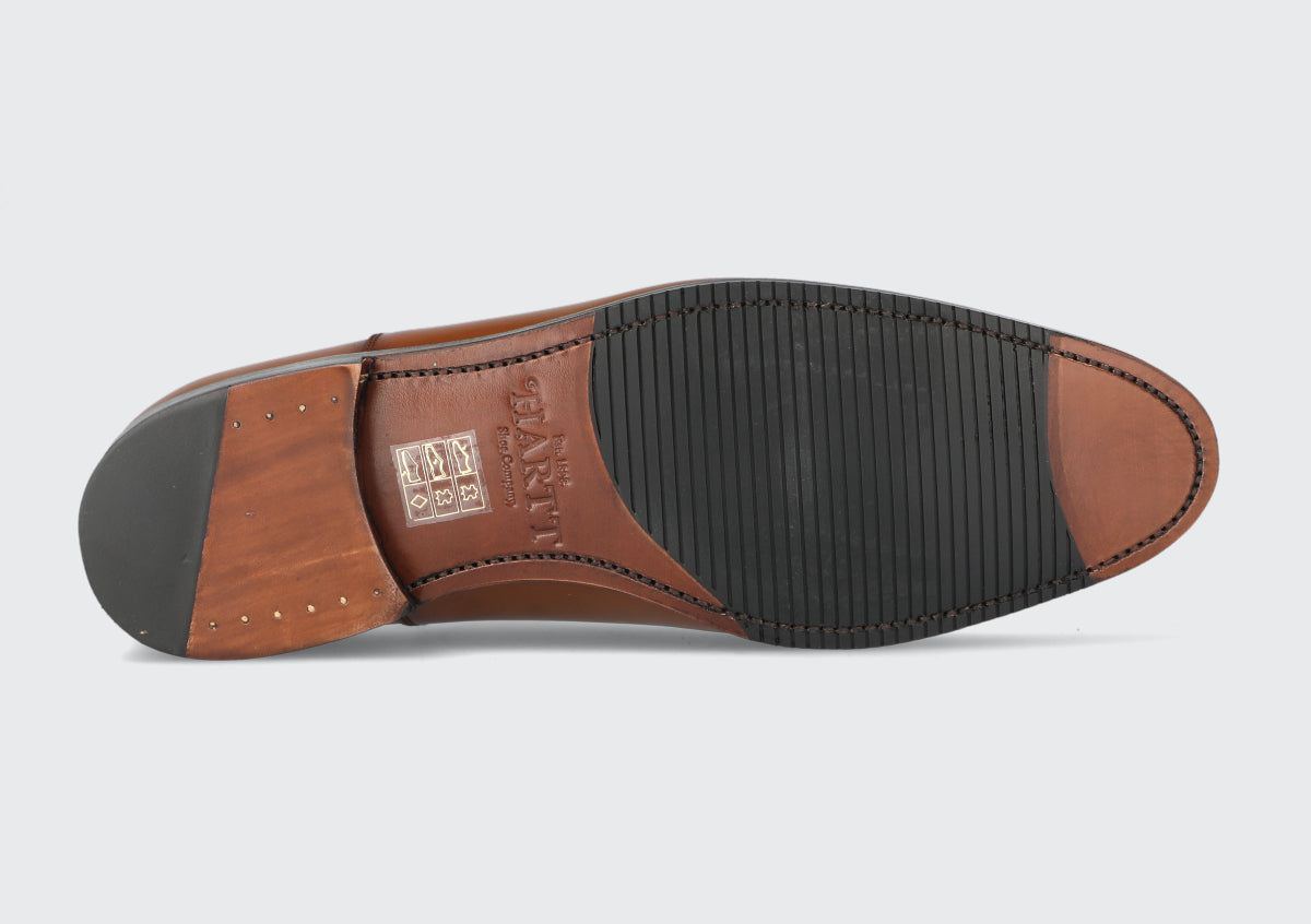 The leather sole of a Goodyear welted pair of men's dress shoes
