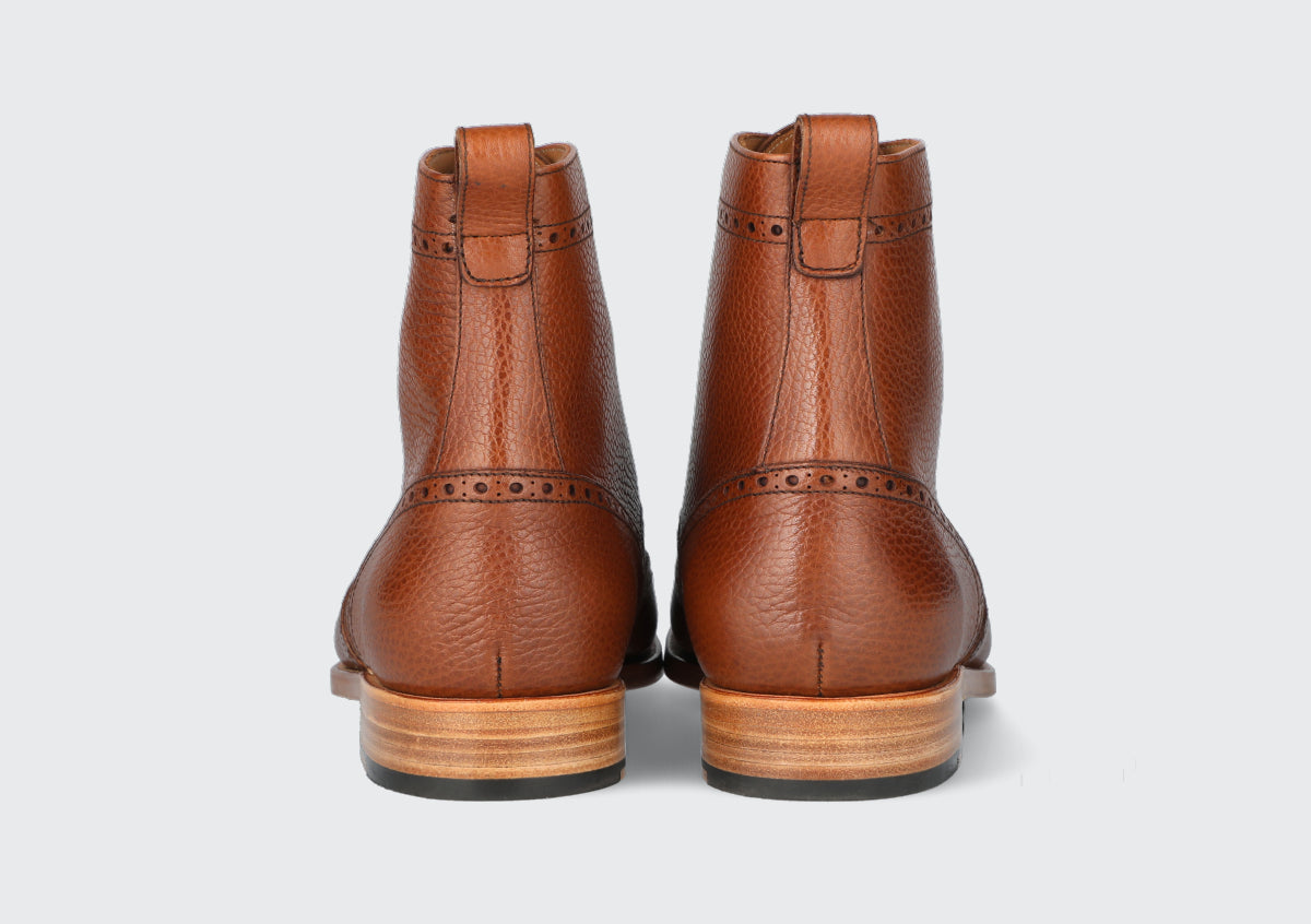 The heels of a pair of men's leather dress boots from the Hartt Shoe company