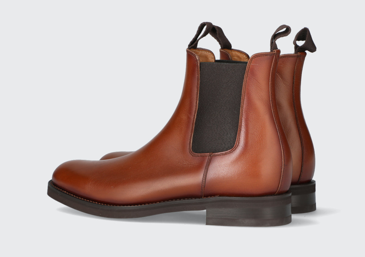 A pair of brown leather chelsea boots from the Hartt Shoe Company