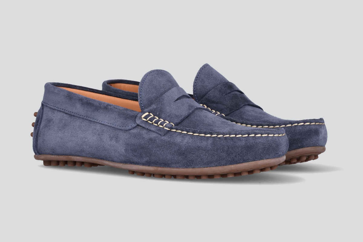 A pair of navy men's miles driver loafers from the Hartt Shoe Company