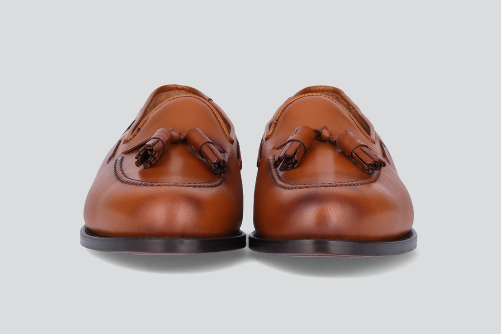 The front of brown men's mckenna loafers from the Hartt Shoe Company