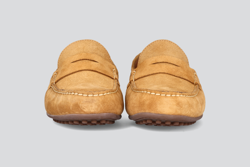 The front of a pair of tan men's miles driver loafers from the Hartt Shoe Company