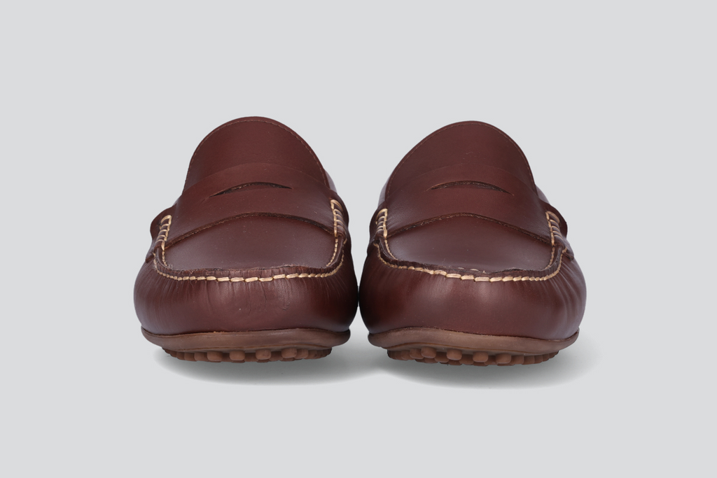 The front of dark brown men's miles driver loafers from the Hartt Shoe Company