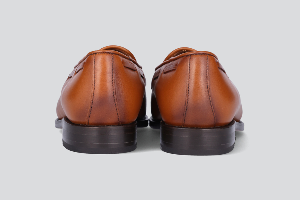 The heels of brown men's mckenna loafers from the Hartt Shoe Company