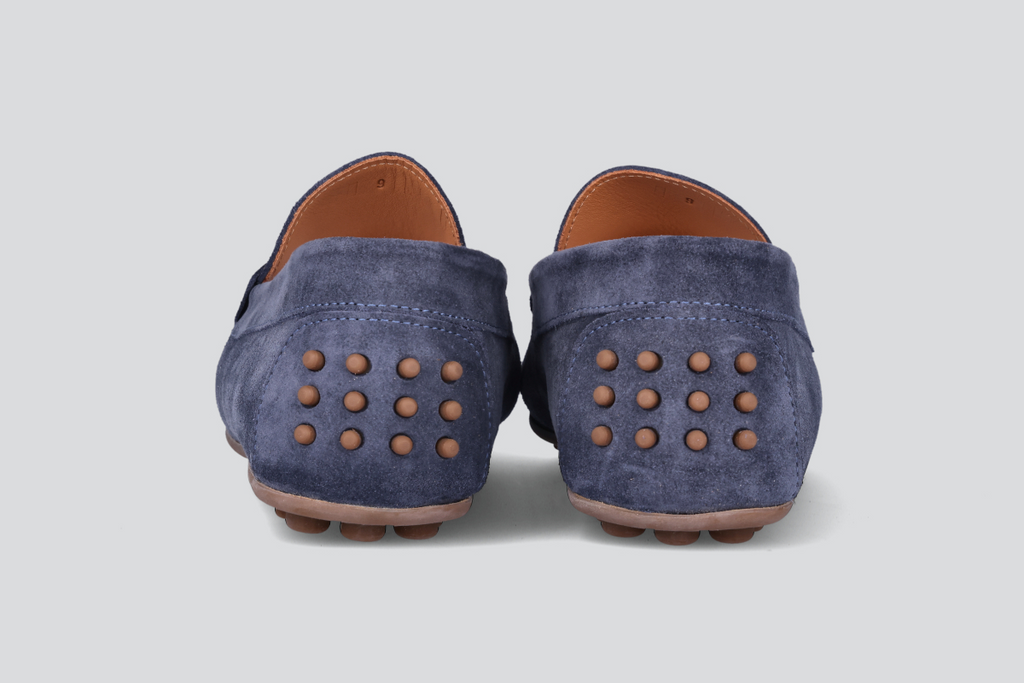 The heels of navy men's miles driver loafers from the Hartt Shoe Company