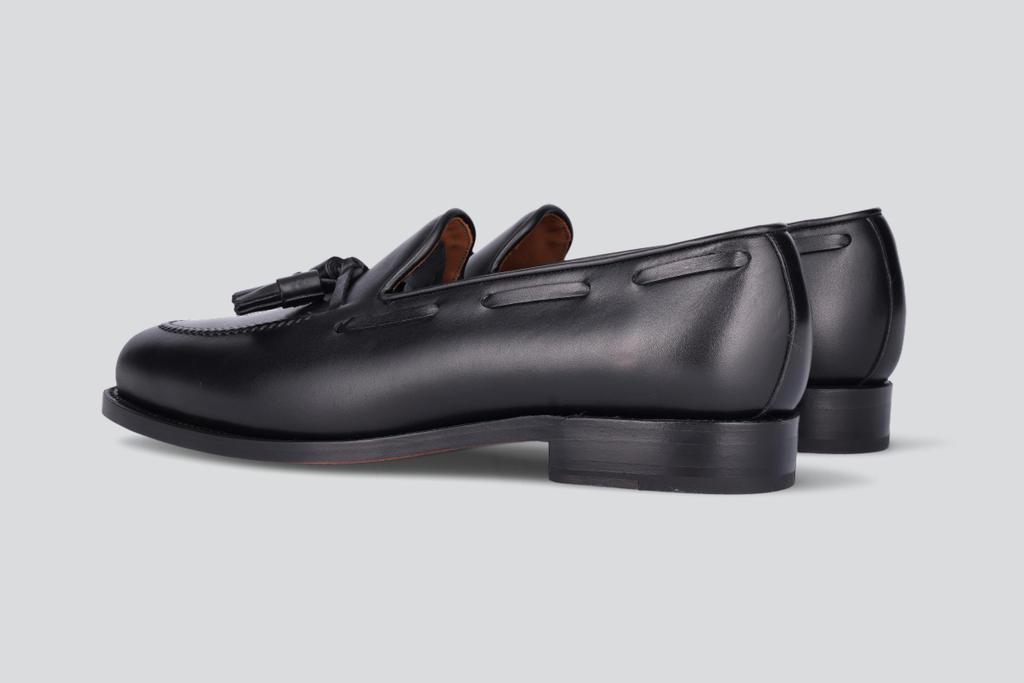A pair of black men's mckenna loafers from the Hartt Shoe Company