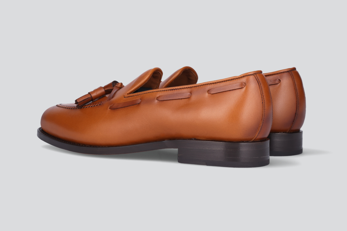 A pair of brown men's mckenna loafers from the Hartt Shoe Company