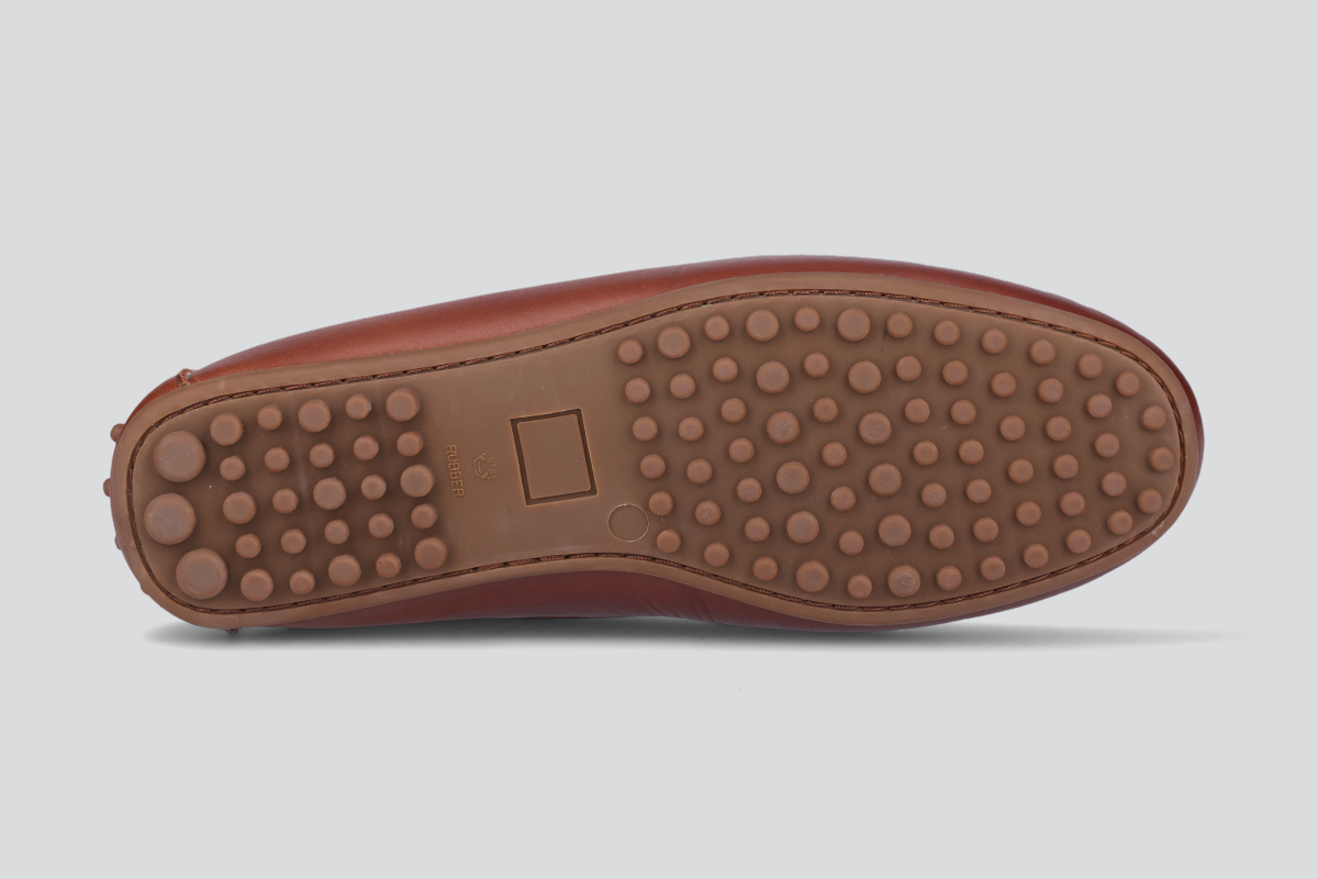 The sole of a bourbon men's miles driver loafers from the Hartt Shoe Company