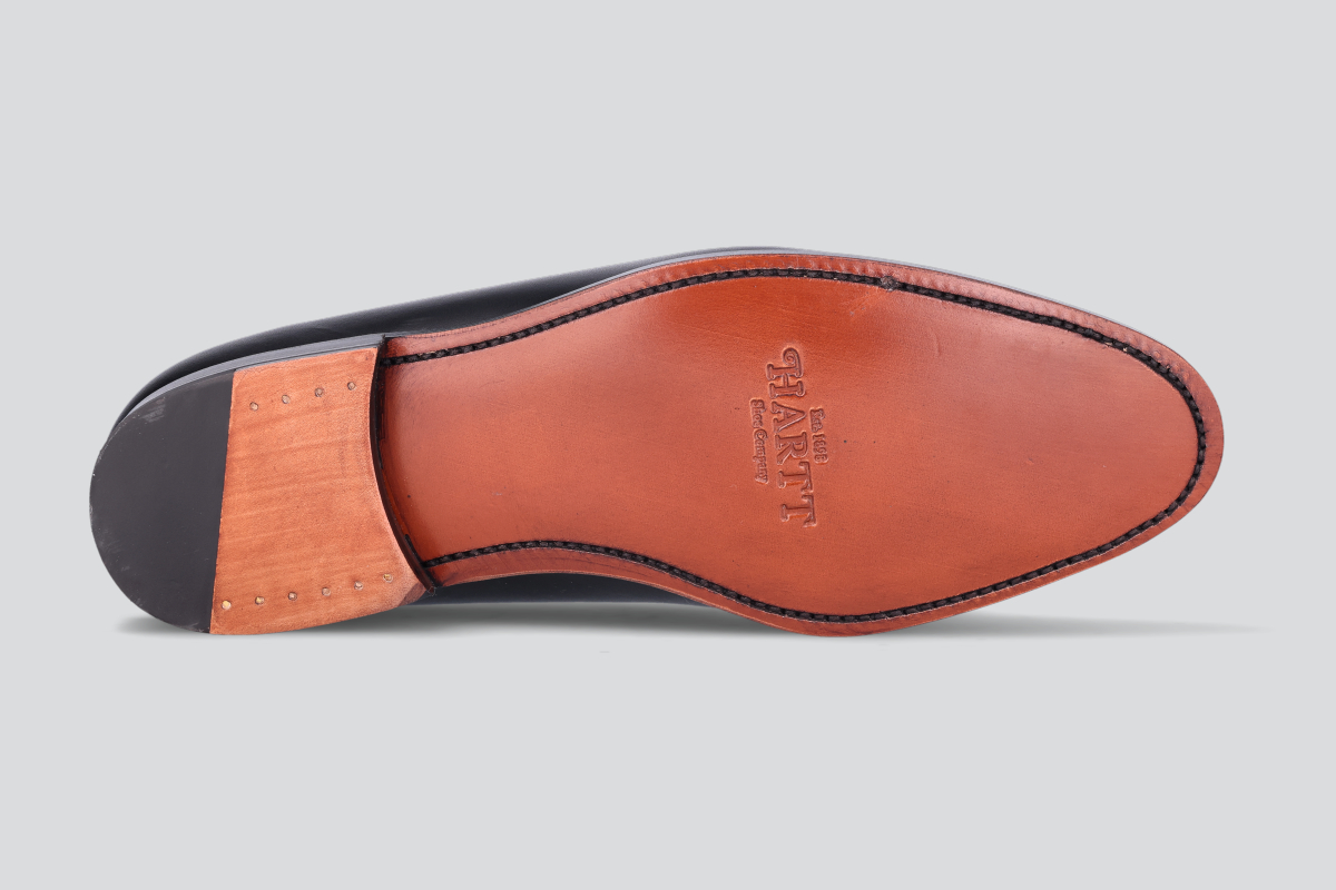 The Goodyear welted sole of a black men's mckenna loafers from the Hartt Shoe Company