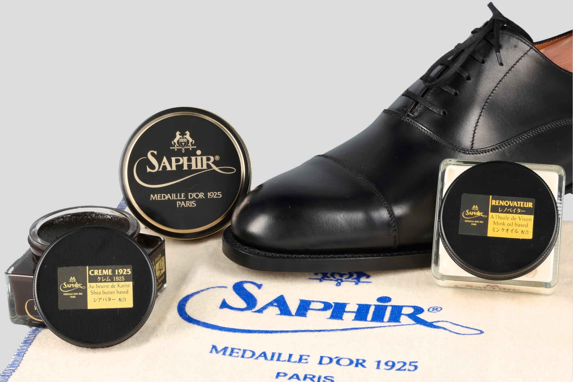 Saphir shoe polish kit with black dress shoe 