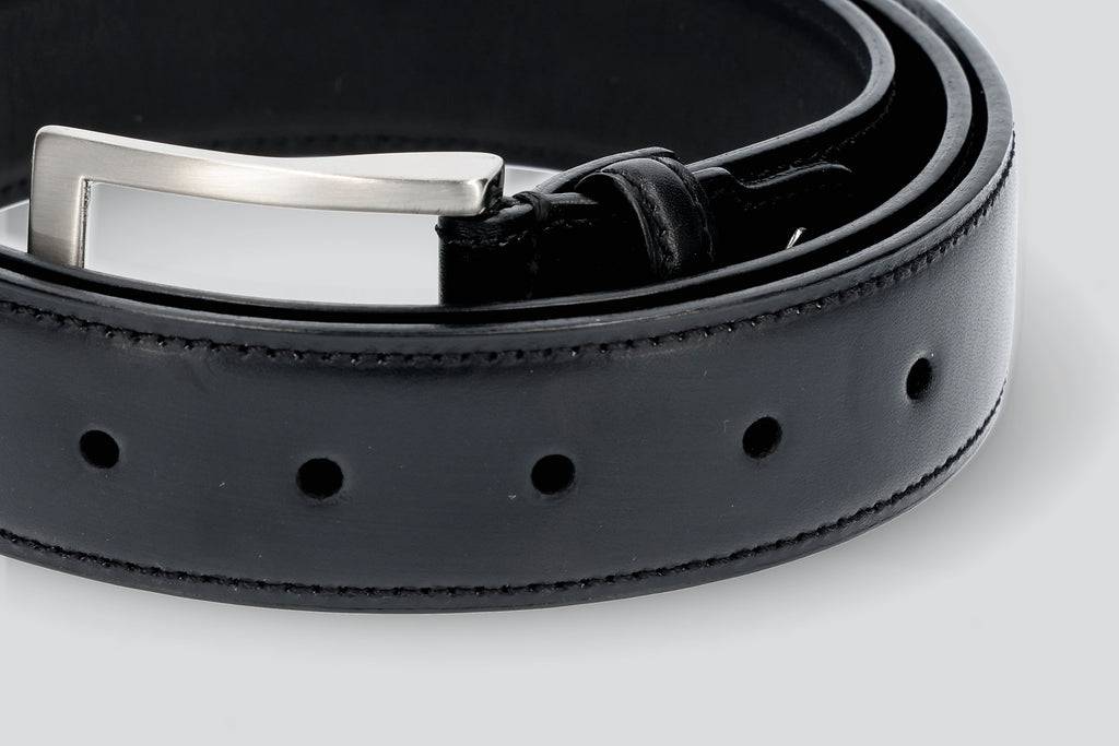 A Black dress belt from the Hartt Shoe company