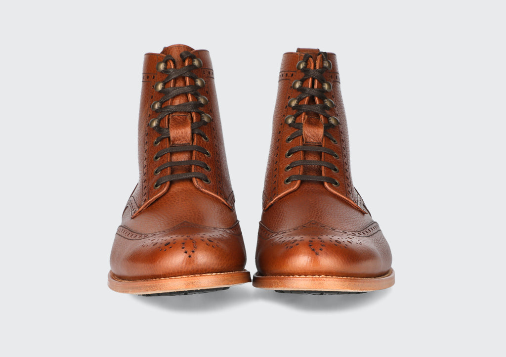 The front of a pair of men's brown leather boots from the Hartt Shoe Company