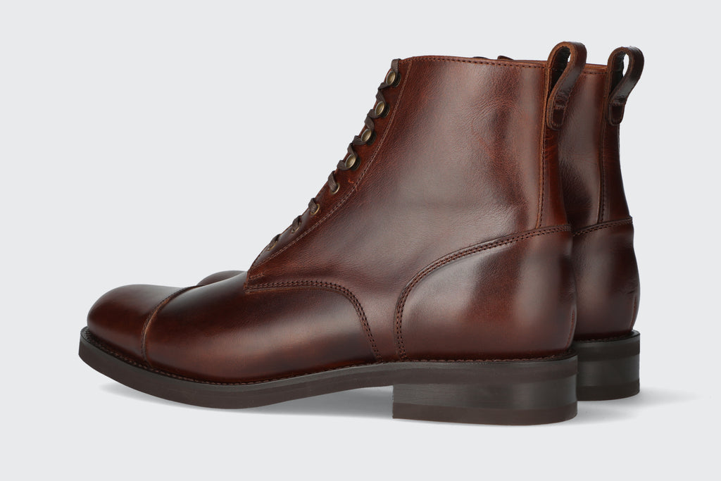 A pair of men's oxblood leather boots from the Hartt Shoe company