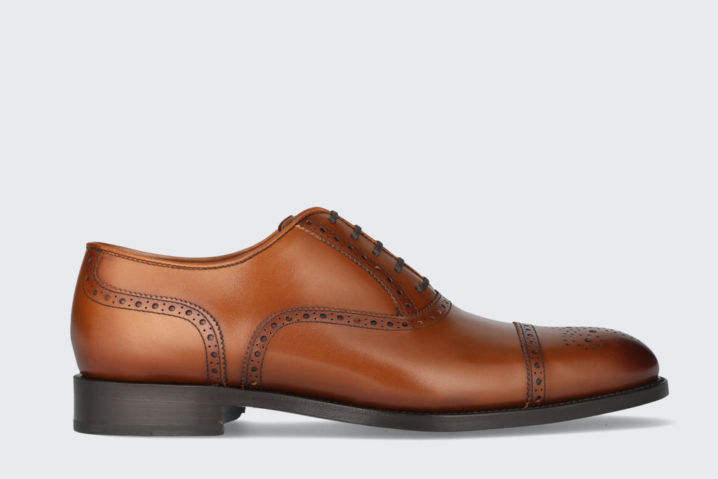 A men's brown leather oxford dress shoe from the Hartt Shoe Company