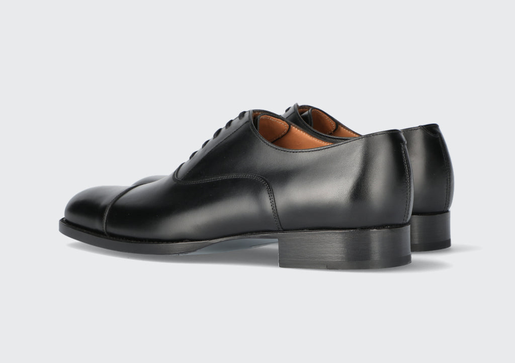 A pair of black leather oxfords from the Hartt Shoe Company