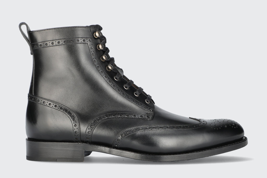 A black men's dress boot from the Hartt Shoe Company