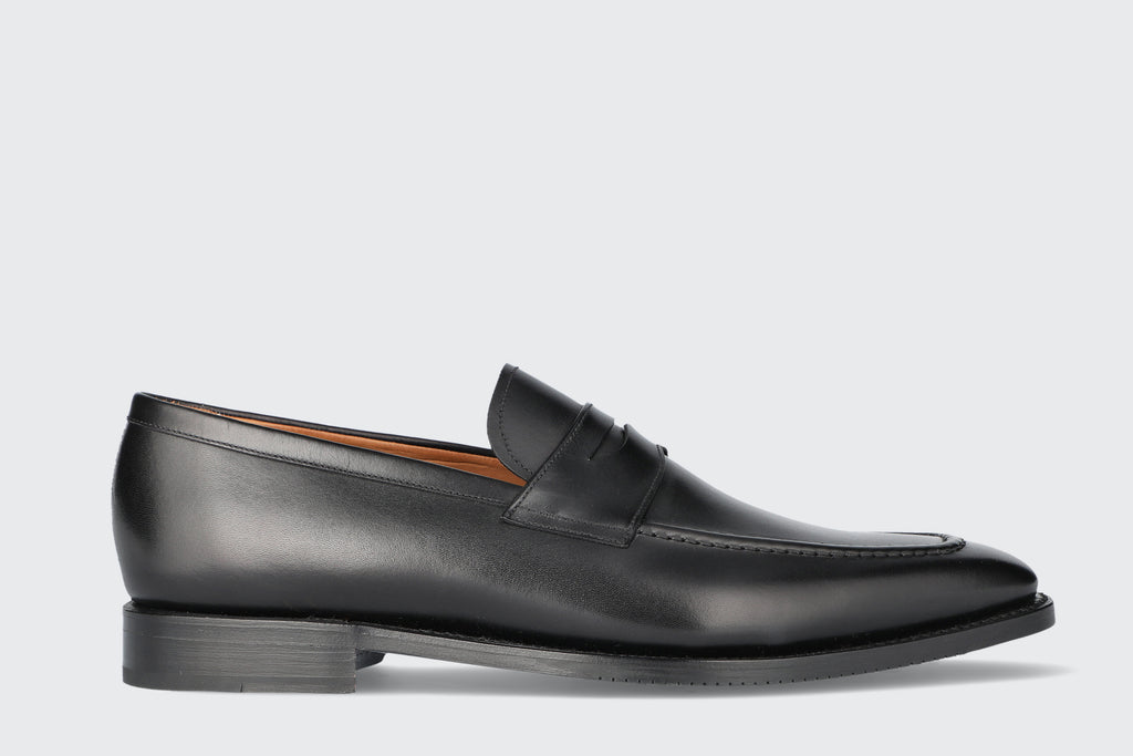 A men's black leather loafer from the Hartt Shoe company