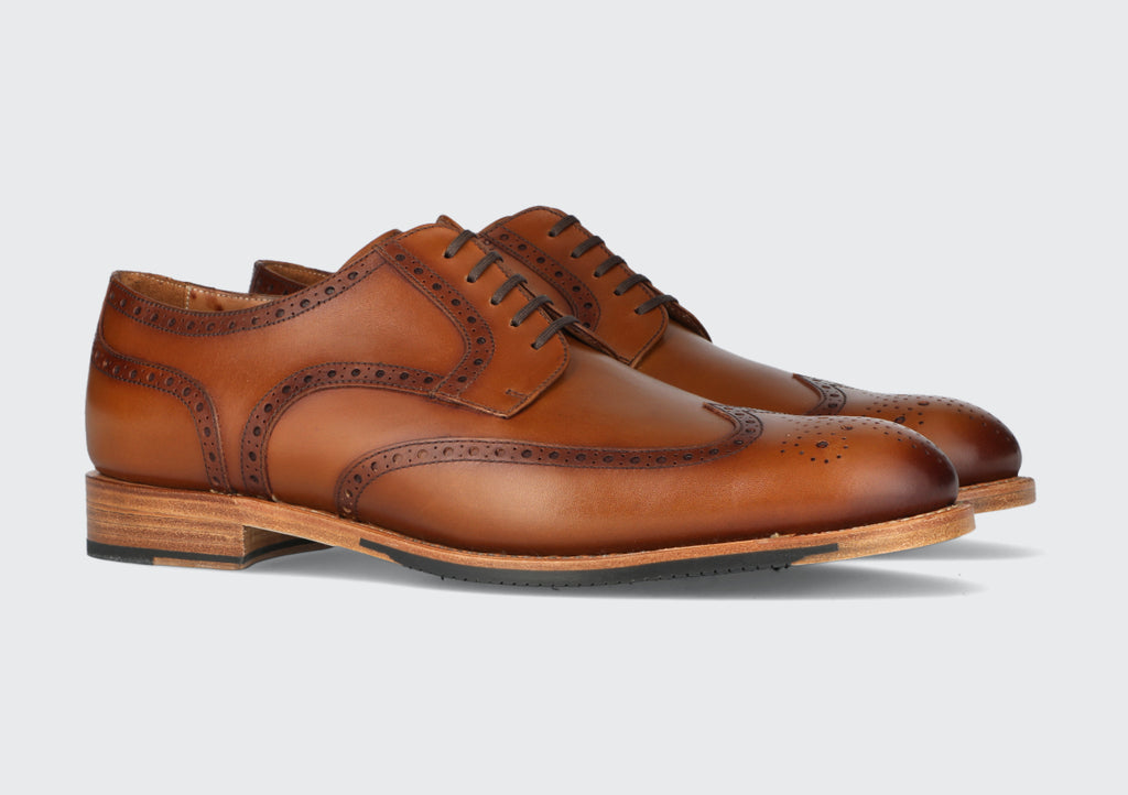 A pair of brown leather derby dress shoes from the Hartt Shoe Company